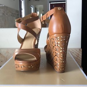 Michael Kora wedges